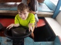 Fredrick Brennan drives a boat.jpg